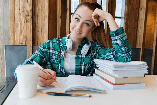 quitting your job, a girl sitting with books